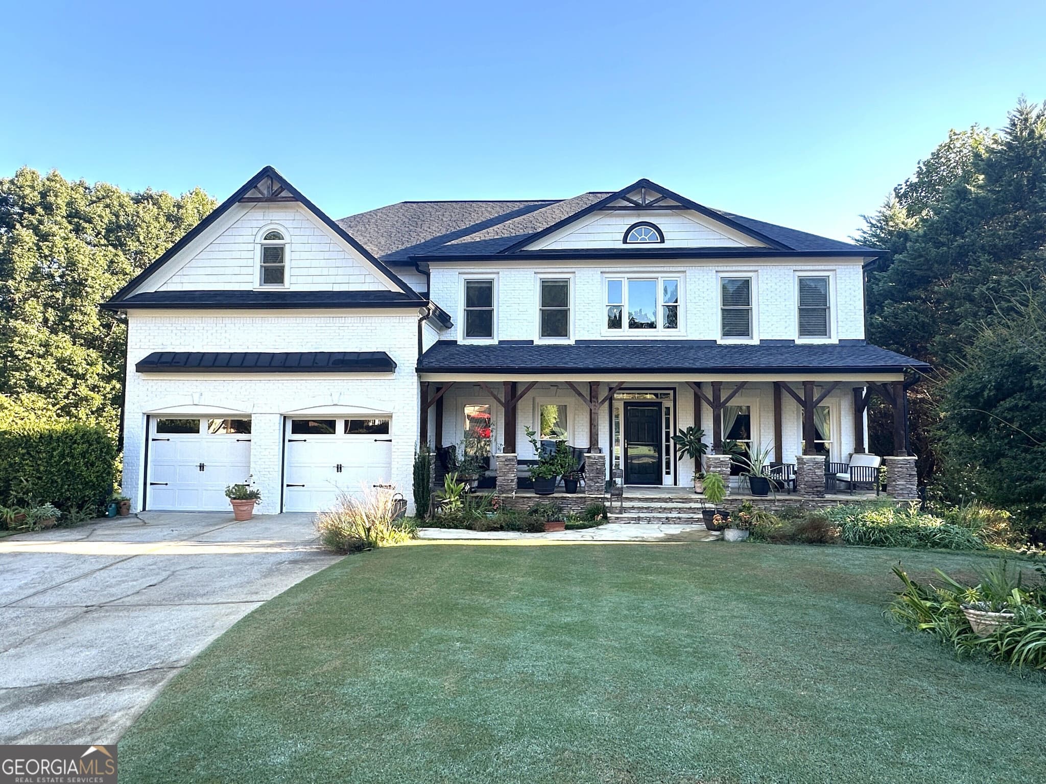 6 bedroom, 4 bathroom, 4,738 sq ft single family residence for sale at 5001 Preservation Pointe, Kennesaw, GA 30152 — photo 1 of 63