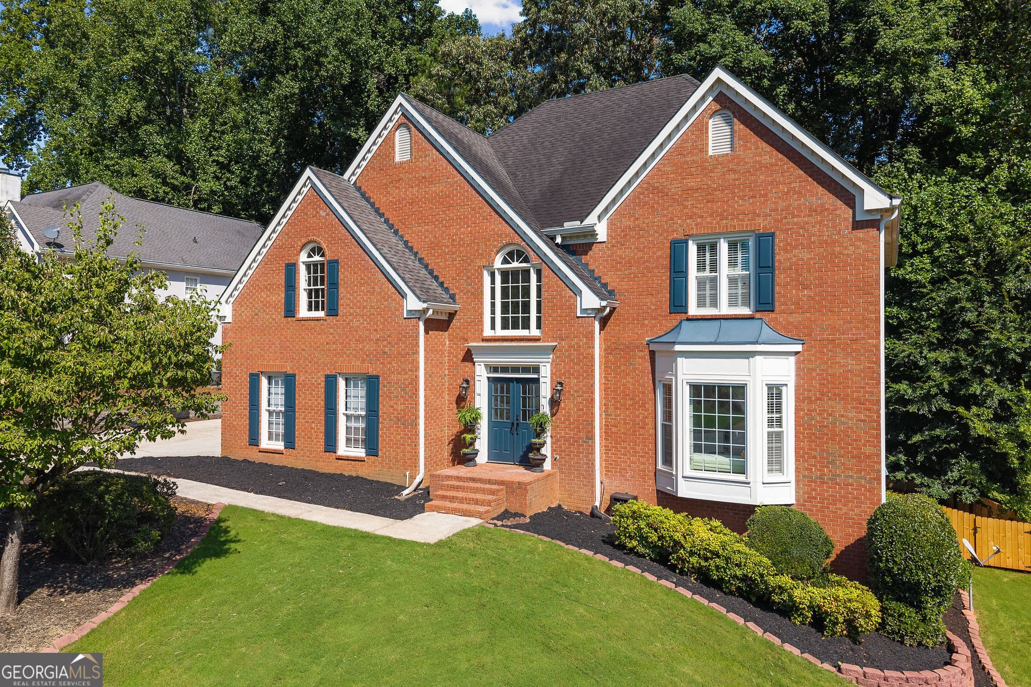 5 bedroom, 4.5 bathroom single family residence for sale at 10245 Groomsbridge Road, Johns Creek, GA 30022 — photo 2