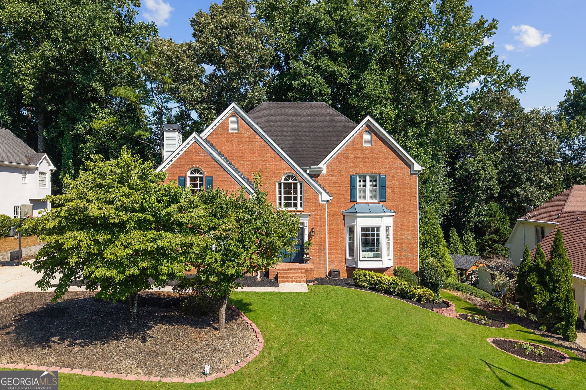 5 bedroom, 4.5 bathroom single family residence for sale at 10245 Groomsbridge Road, Johns Creek, GA 30022 — photo 6