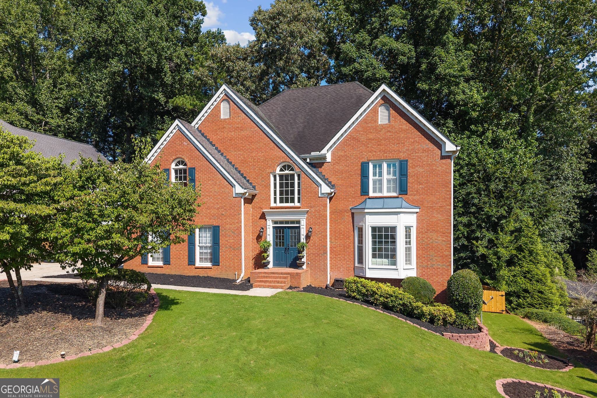 5 bedroom, 4.5 bathroom single family residence for sale at 10245 Groomsbridge Road, Johns Creek, GA 30022