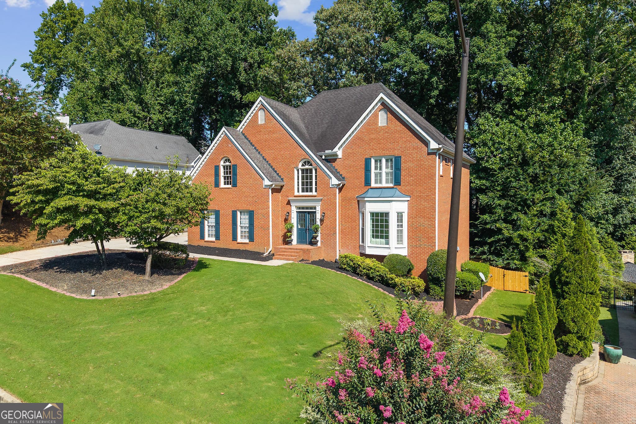 5 bedroom, 4.5 bathroom single family residence for sale at 10245 Groomsbridge Road, Johns Creek, GA 30022 — photo 5