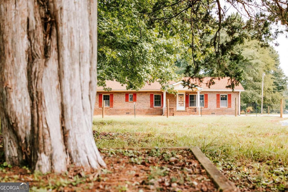 3 bedroom, 2 bathroom, 1,344 sq ft single family residence for sale at 621 Elberton Road, Lexington, GA 30648 — photo 2