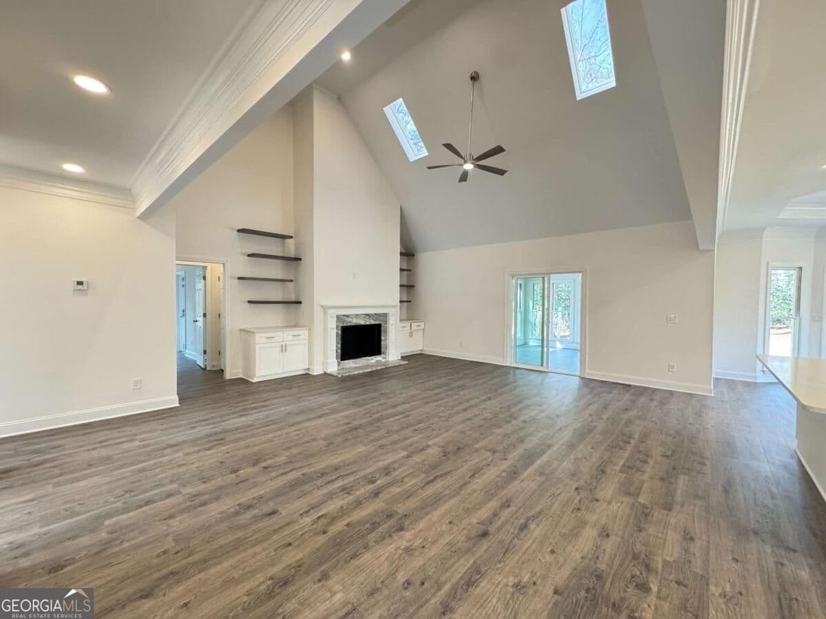 5 bedroom, 4.5 bathroom, 4,043 sq ft single family residence for sale at 9240 Prestwick Club Drive, Duluth, GA 30097 — photo 2