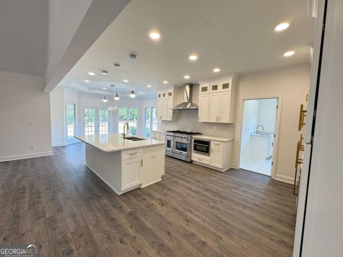 5 bedroom, 4.5 bathroom, 4,043 sq ft single family residence for sale at 9240 Prestwick Club Drive, Duluth, GA 30097 — photo 7