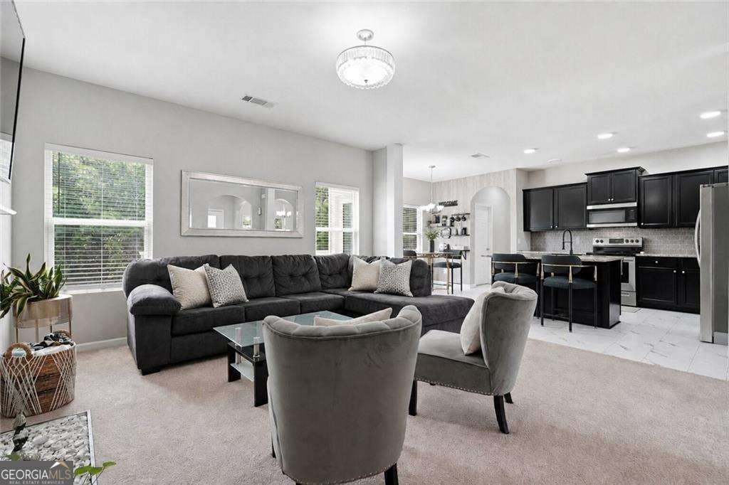 4 bedroom, 2.5 bathroom, 4,361 sq ft single family residence for sale at 1410 Miller Cove Lane, Bethlehem, GA 30620 — photo 5
