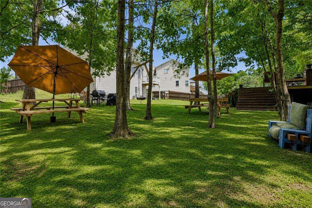 4 bedroom, 2.5 bathroom, 4,361 sq ft single family residence for sale at 1410 Miller Cove Lane, Bethlehem, GA 30620 — photo 9