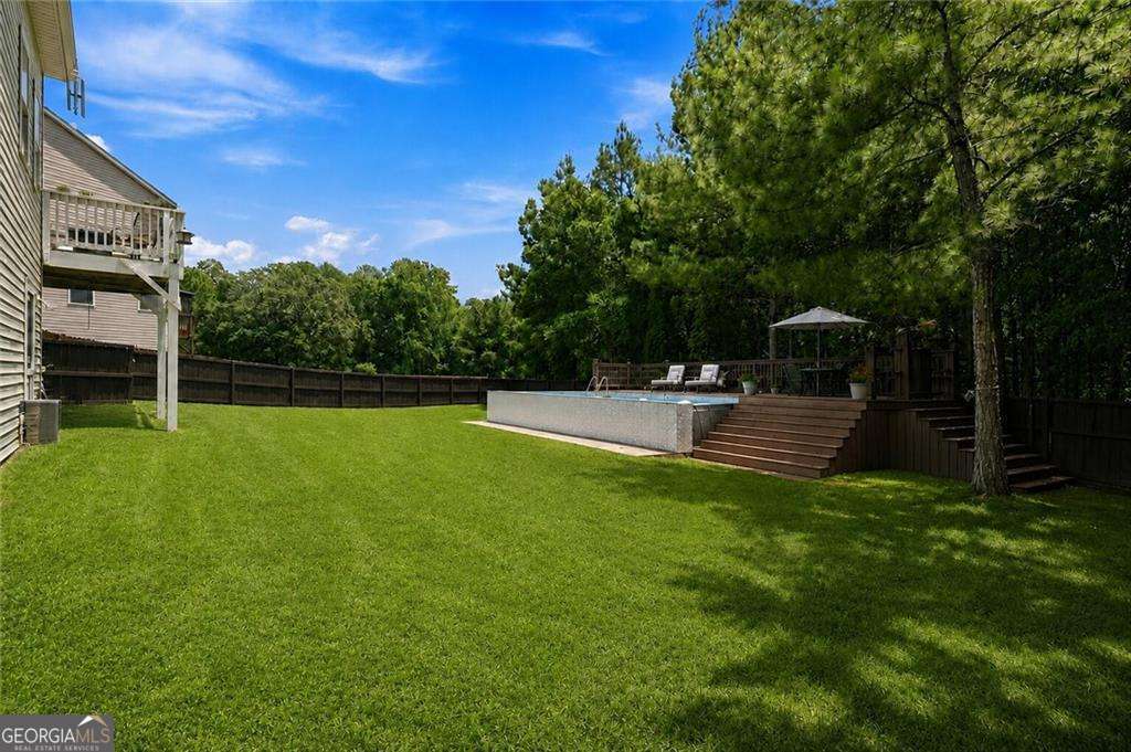 4 bedroom, 2.5 bathroom, 4,361 sq ft single family residence for sale at 1410 Miller Cove Lane, Bethlehem, GA 30620 — photo 8