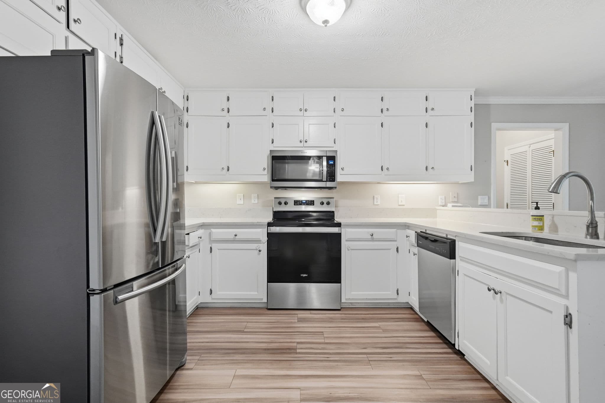 4 bedroom, 3.5 bathroom single family residence for sale at 2770 Cambridge Hills Road, Cumming, GA 30041 — photo 7