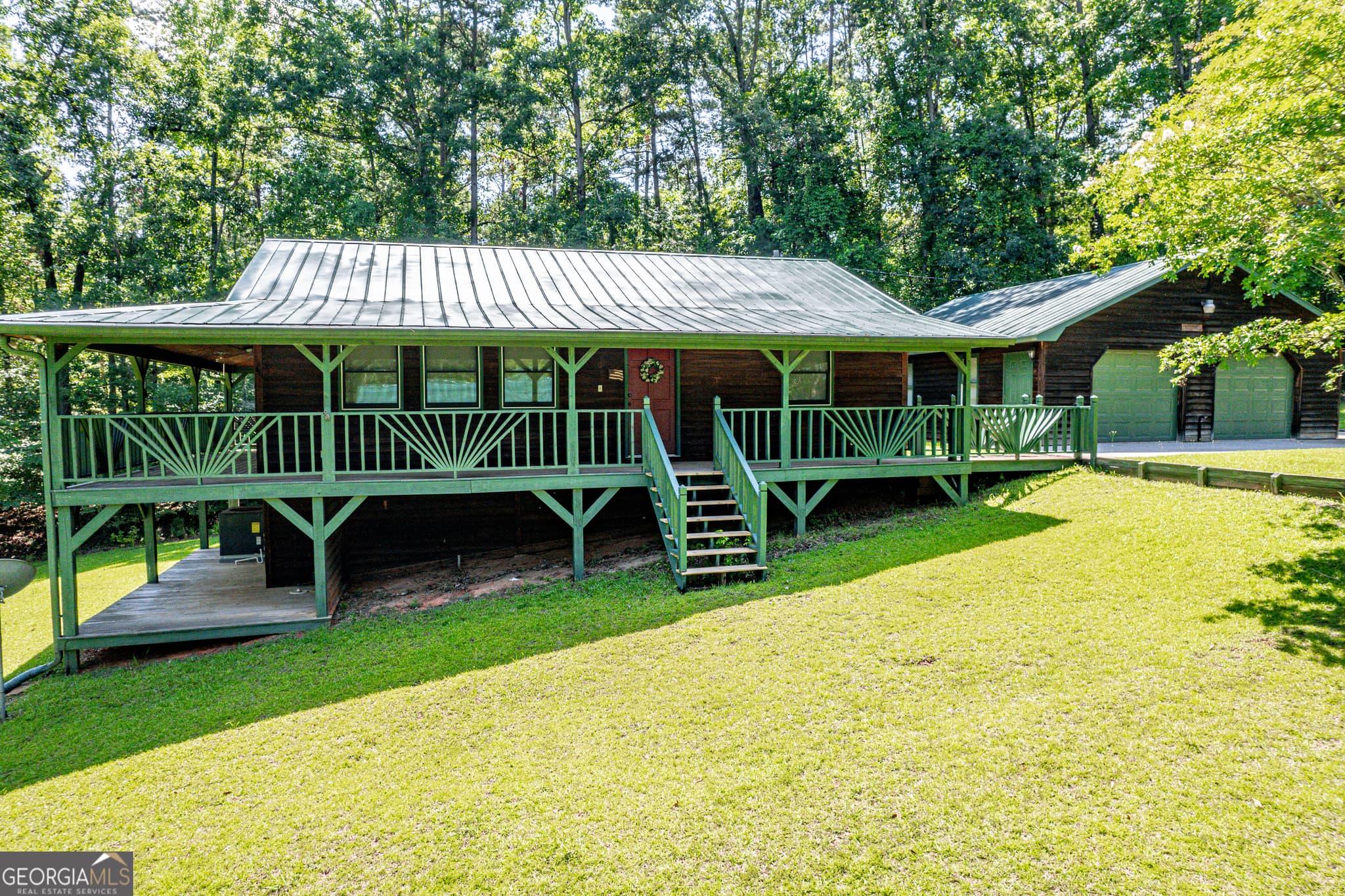 4 bedroom, 2 bathroom, 2,128 sq ft cabin,single family residence for sale at 671/673 Pine Lake Drive, Sparta, GA 31087 — photo 2