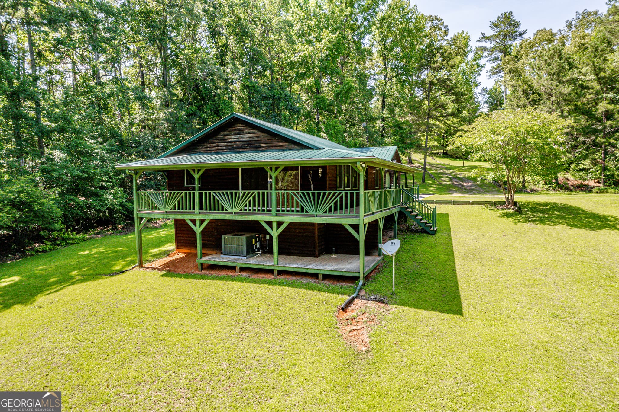 4 bedroom, 2 bathroom, 2,128 sq ft cabin,single family residence for sale at 671/673 Pine Lake Drive, Sparta, GA 31087 — photo 3