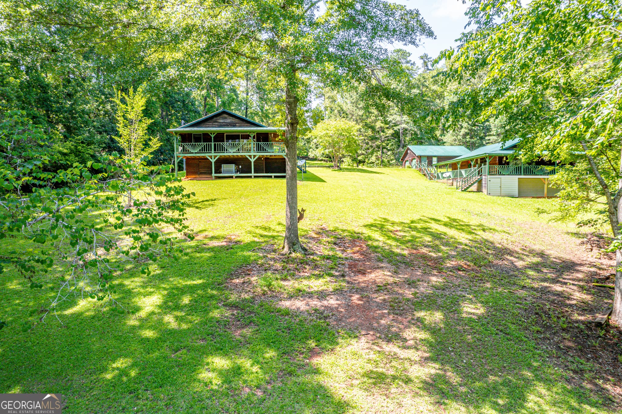 4 bedroom, 2 bathroom, 2,128 sq ft cabin,single family residence for sale at 671/673 Pine Lake Drive, Sparta, GA 31087 — photo 1 of 32