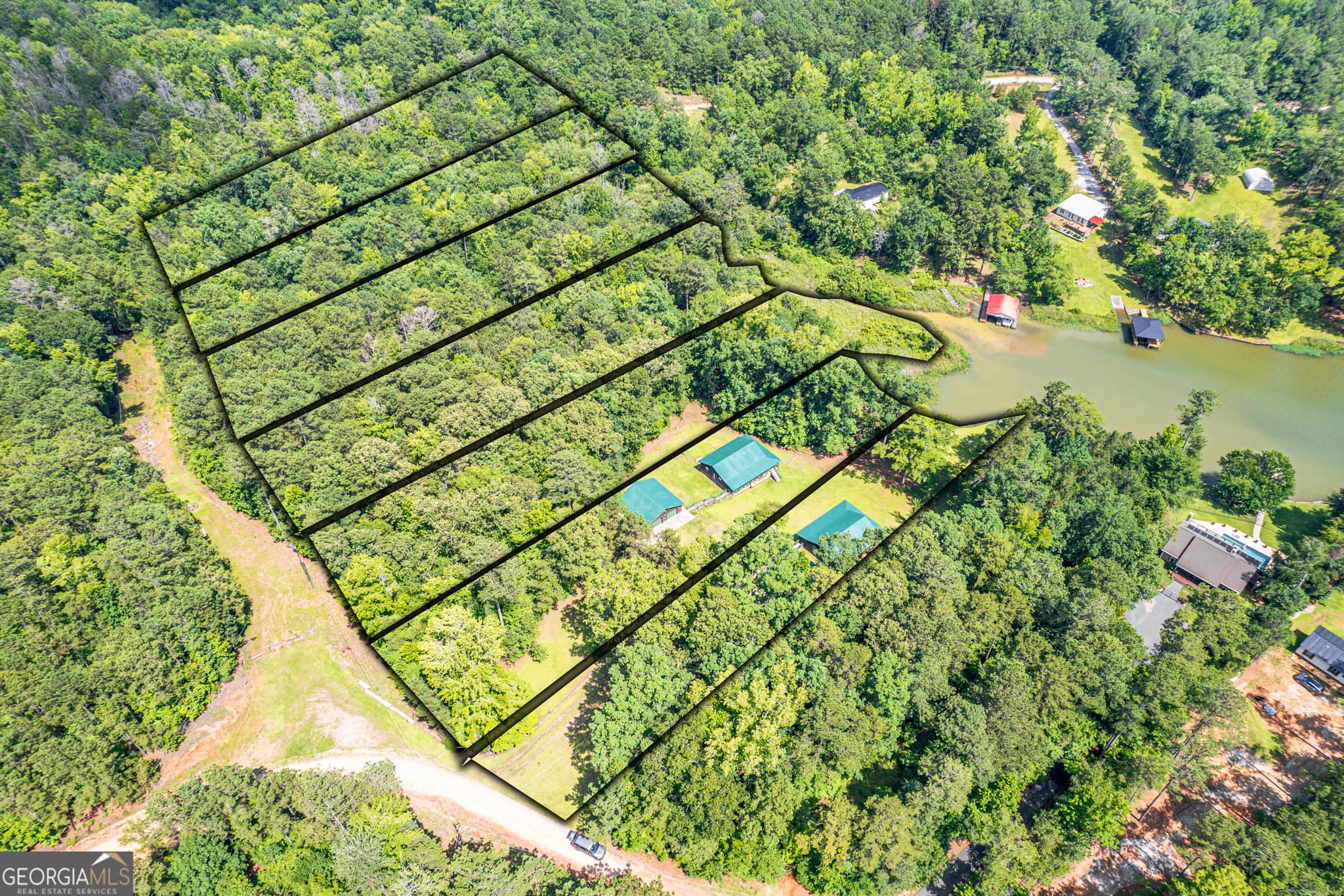 4 bedroom, 2 bathroom, 2,128 sq ft cabin,single family residence for sale at 671/673 Pine Lake Drive, Sparta, GA 31087 — photo 4
