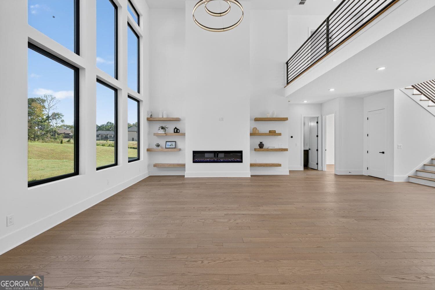 4 bedroom, 4.5 bathroom, 4,890 sq ft single family residence for sale at 125 Rocky Ridge Way, Auburn, GA 30011 — photo 5