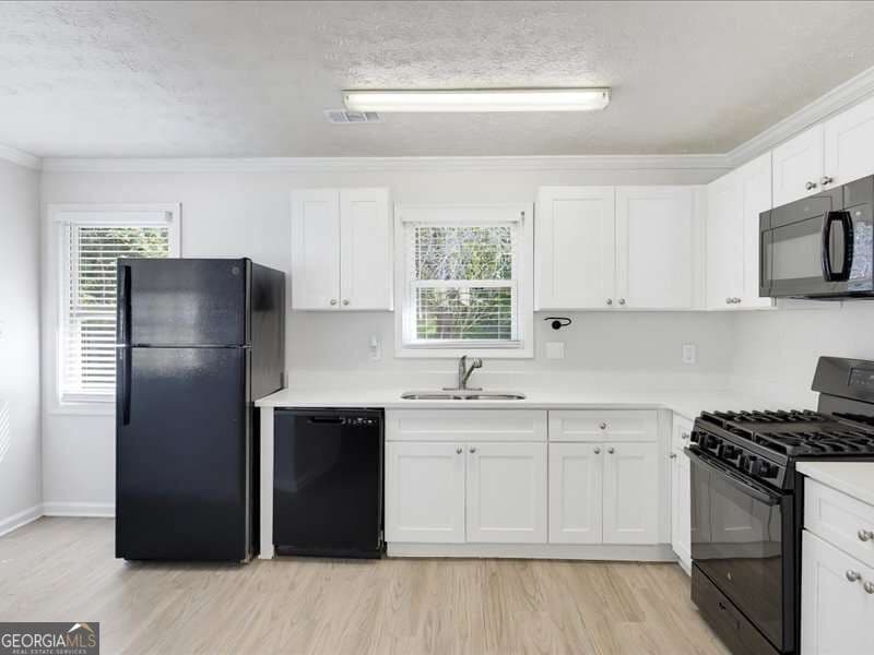 3 bedroom, 2 bathroom, 1,162 sq ft single family residence for sale at 3072 Palomino Drive, Powder Springs, GA 30127 — photo 2