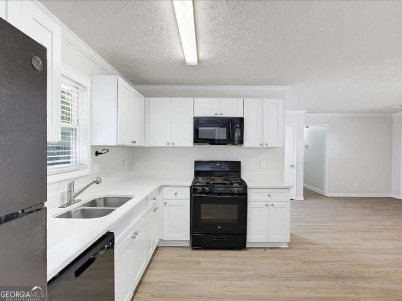 3 bedroom, 2 bathroom, 1,162 sq ft single family residence for sale at 3072 Palomino Drive, Powder Springs, GA 30127 — photo 3