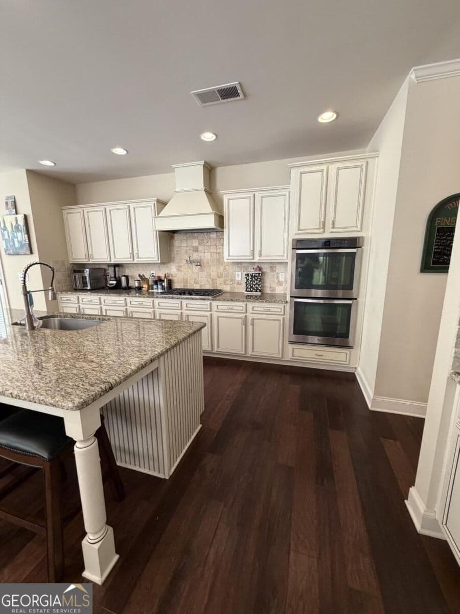 6 bedroom, 4.5 bathroom, 5,318 sq ft single family residence for sale at 460 Brookwood Estates Drive, Alpharetta, GA 30005 — photo 5