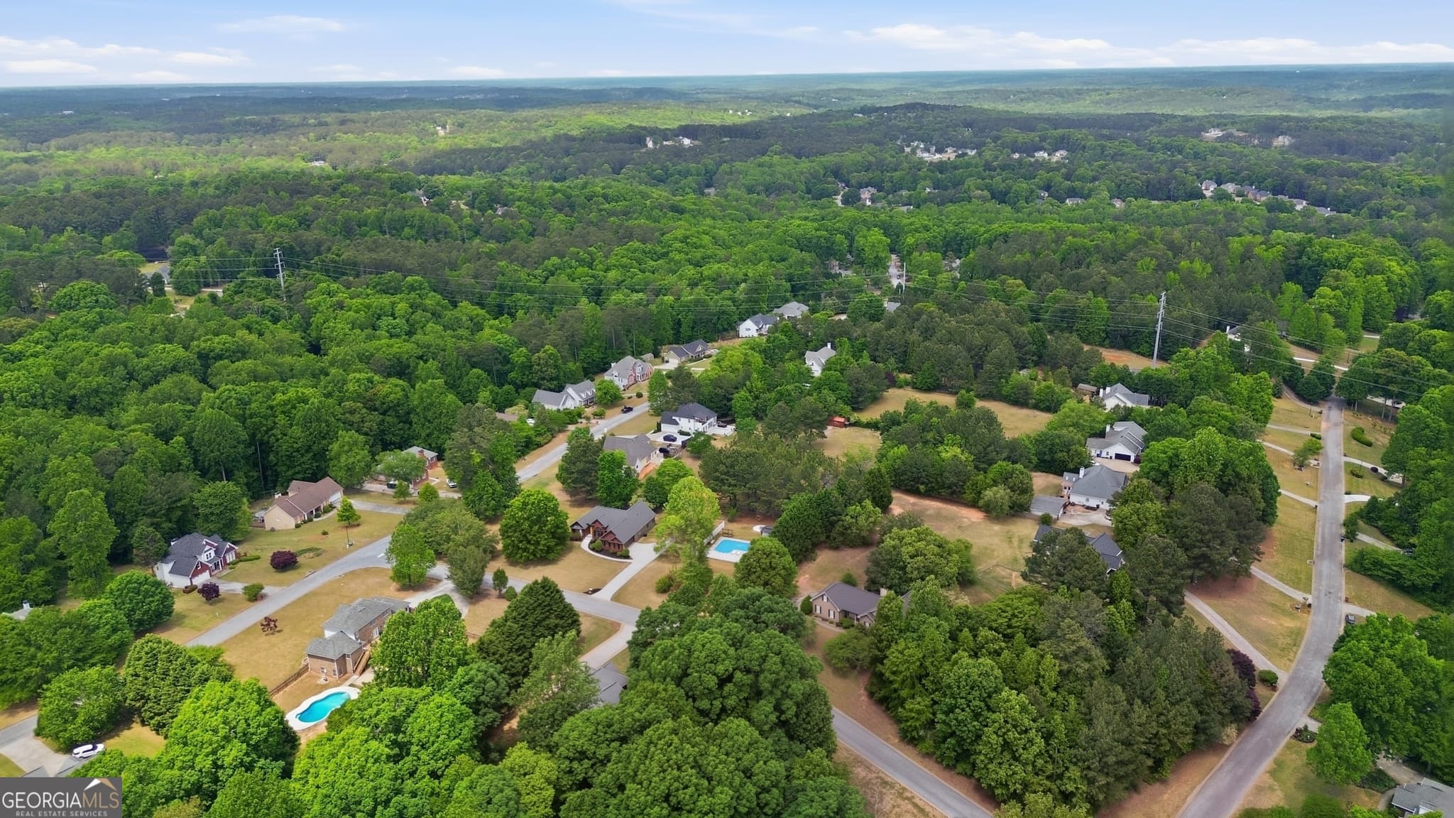 3 bedroom, 4 bathroom, 3,460 sq ft single family residence for sale at 2015 Wood Valley Drive, Loganville, GA 30052 — photo 6