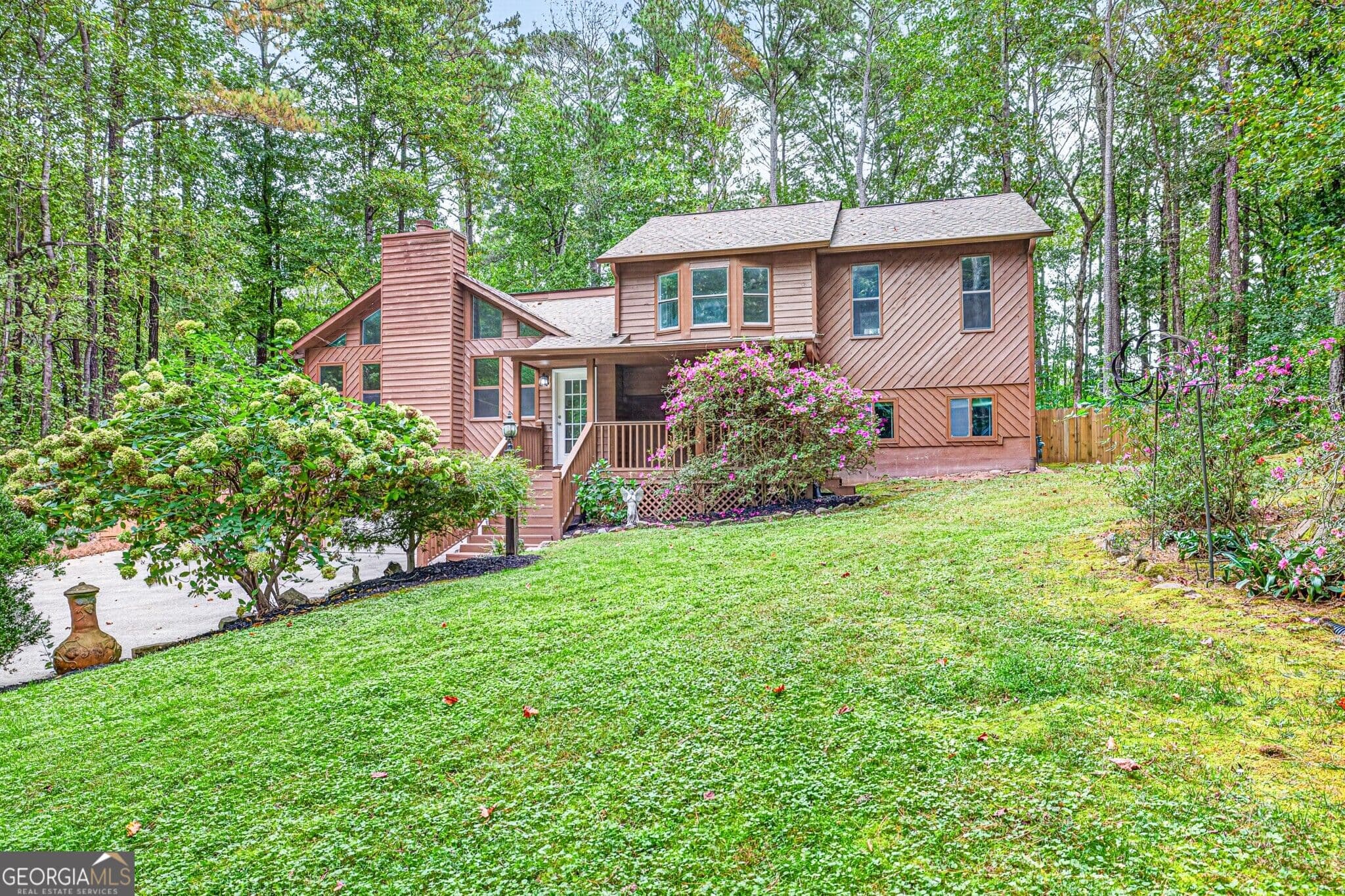 5 bedroom, 3 bathroom, 2,532 sq ft single family residence for sale at 3570 Daylon Drive, Cumming, GA 30028 — photo 2