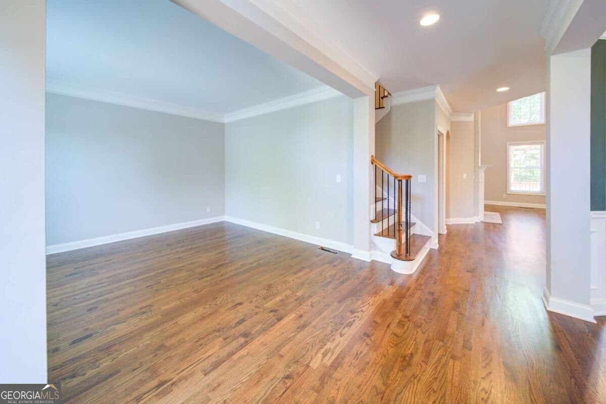 6 bedroom, 4.5 bathroom, 5,300 sq ft single family residence for sale at 5660 Cascade Trail, Cumming, GA 30040 — photo 2