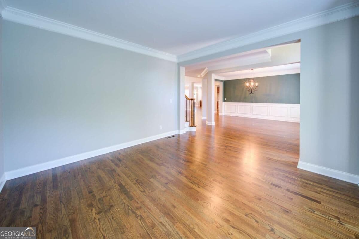 6 bedroom, 4.5 bathroom, 5,300 sq ft single family residence for sale at 5660 Cascade Trail, Cumming, GA 30040 — photo 5