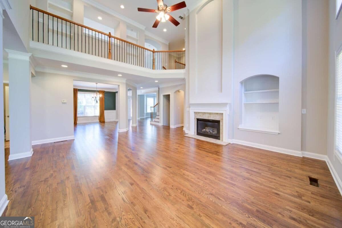 6 bedroom, 4.5 bathroom, 5,300 sq ft single family residence for sale at 5660 Cascade Trail, Cumming, GA 30040 — photo 10