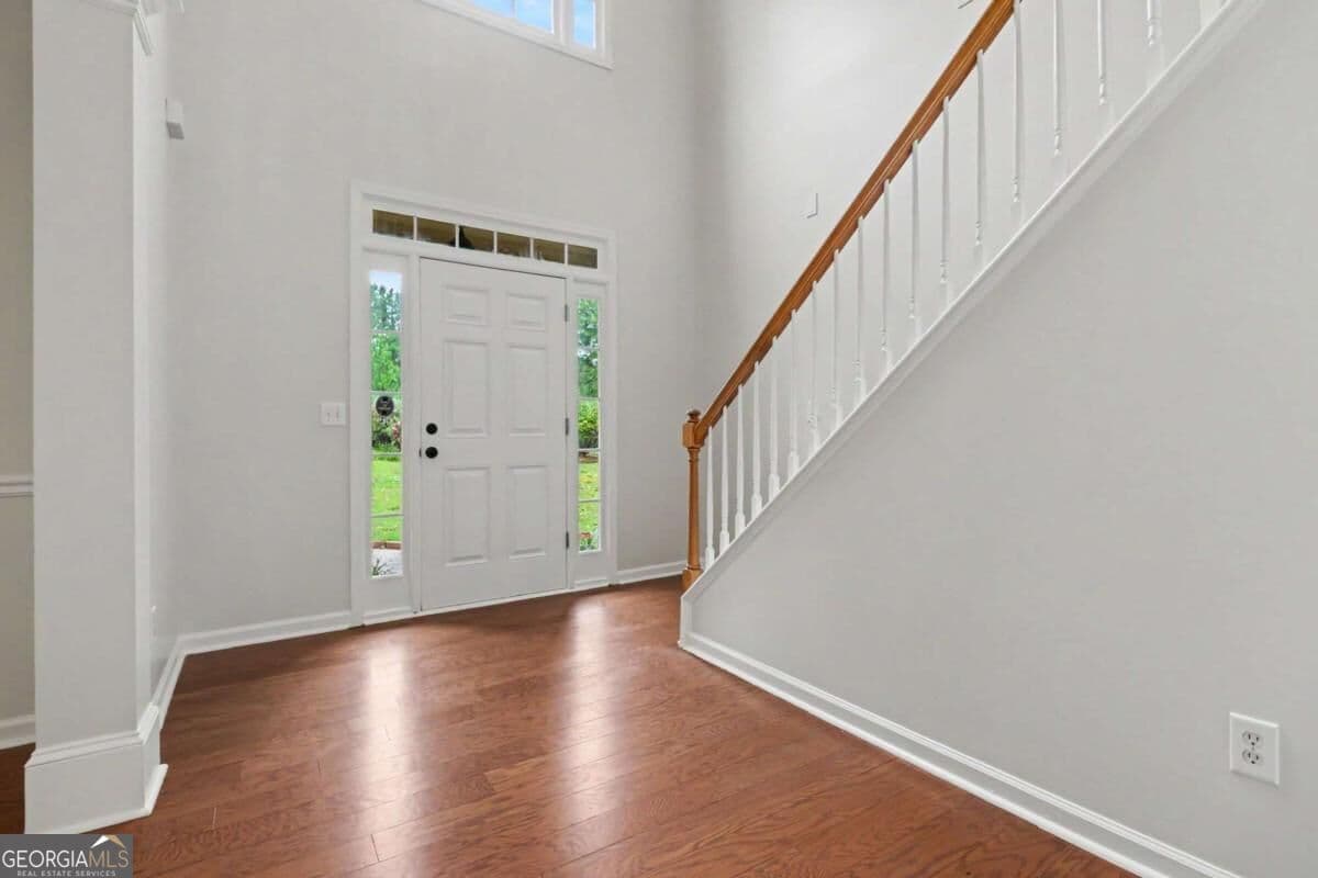 5 bedroom, 3 bathroom, 2,369 sq ft single family residence for sale at 6220 Ivey Hill Drive, Cumming, GA 30040 — photo 7