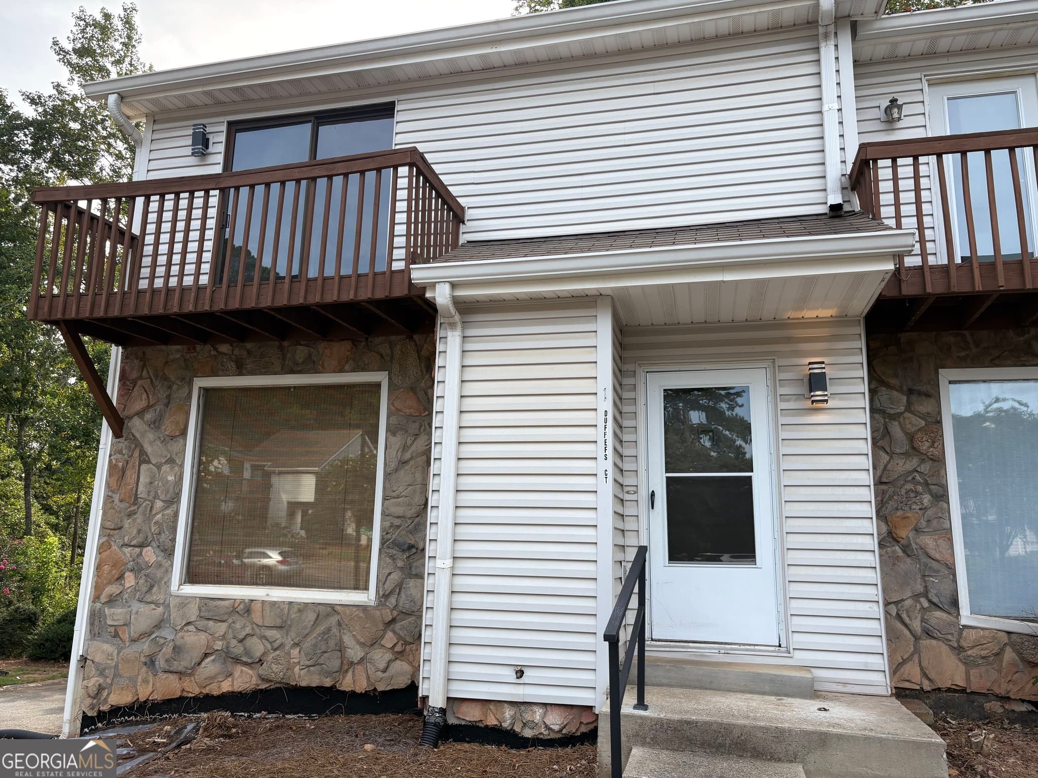 4 bedroom, 3.5 bathroom, 2,396 sq ft townhouse for rent at 1 Duffers Court, Kennesaw, GA 30144 for $2,400 a month — photo 1 of 36