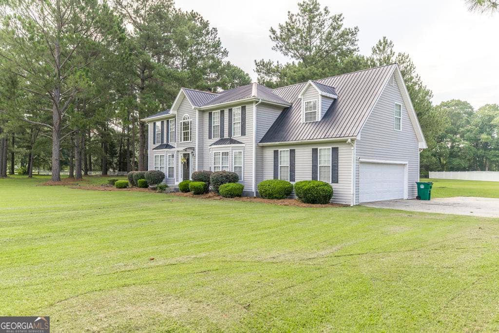 4 bedroom, 2.5 bathroom, 2,454 sq ft single family residence for sale at 300 Saddle Creek Drive, Cordele, GA 31015 — photo 2