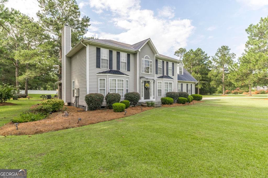 4 bedroom, 2.5 bathroom, 2,454 sq ft single family residence for sale at 300 Saddle Creek Drive, Cordele, GA 31015 — photo 3