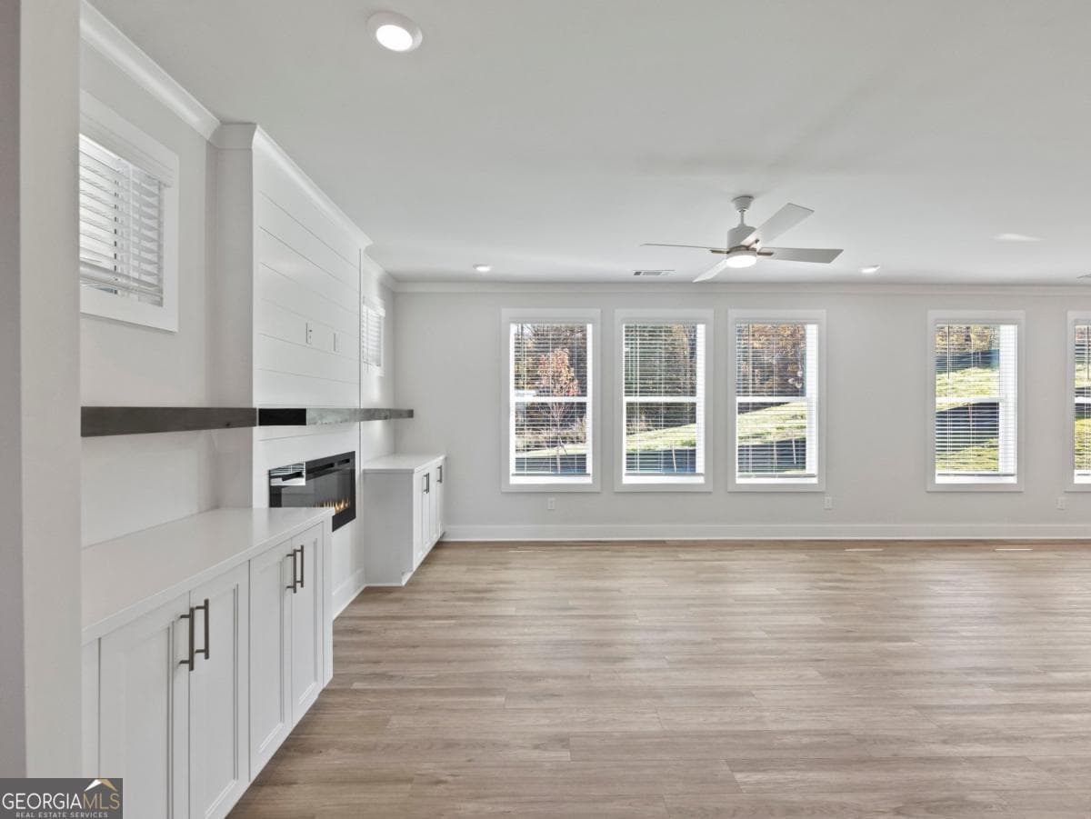 5 bedroom, 4 bathroom single family residence for sale at 2410 Reserve Manor Court, Lawrenceville, GA 30043 — photo 6