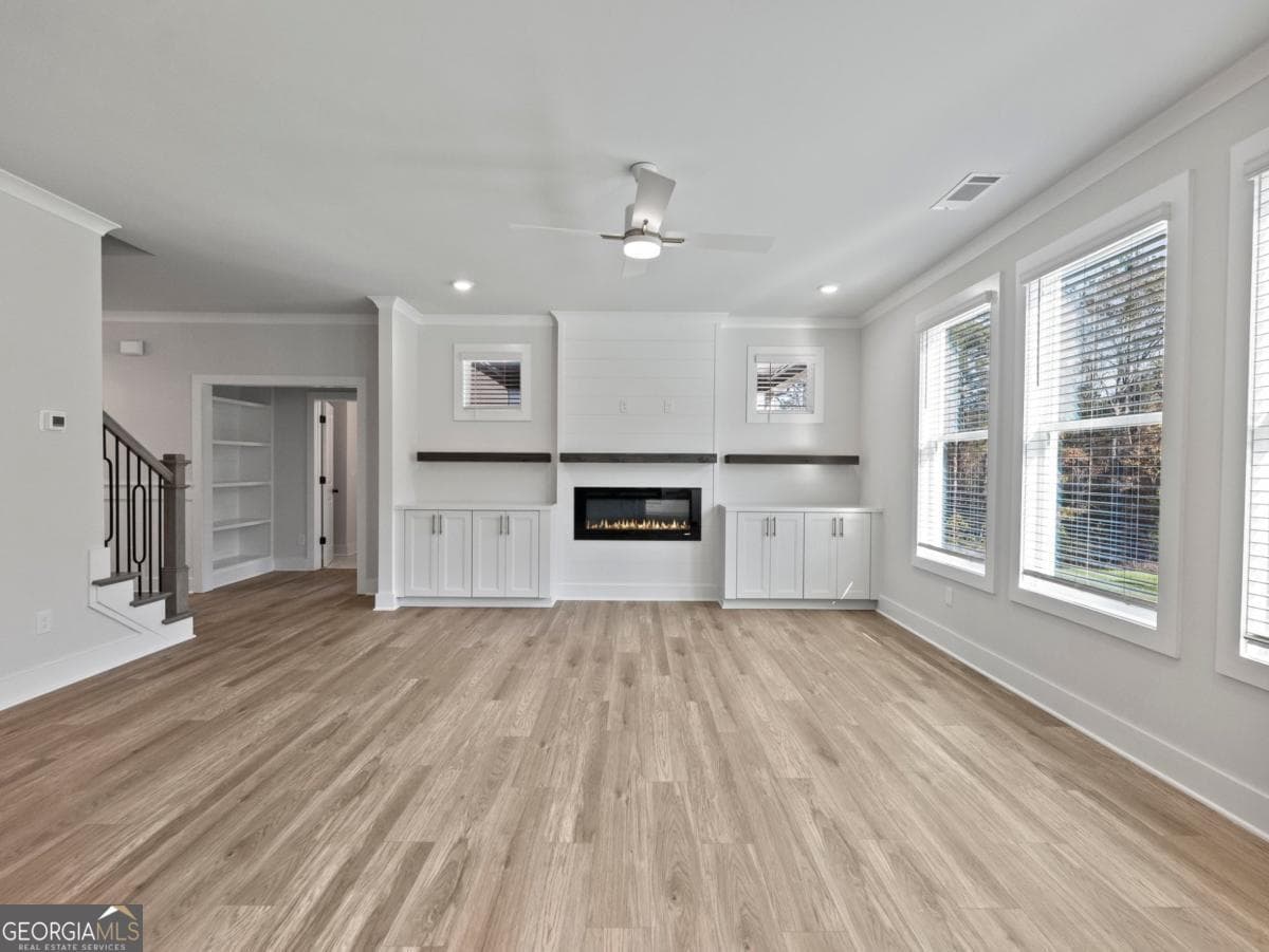 5 bedroom, 4 bathroom single family residence for sale at 2410 Reserve Manor Court, Lawrenceville, GA 30043 — photo 7