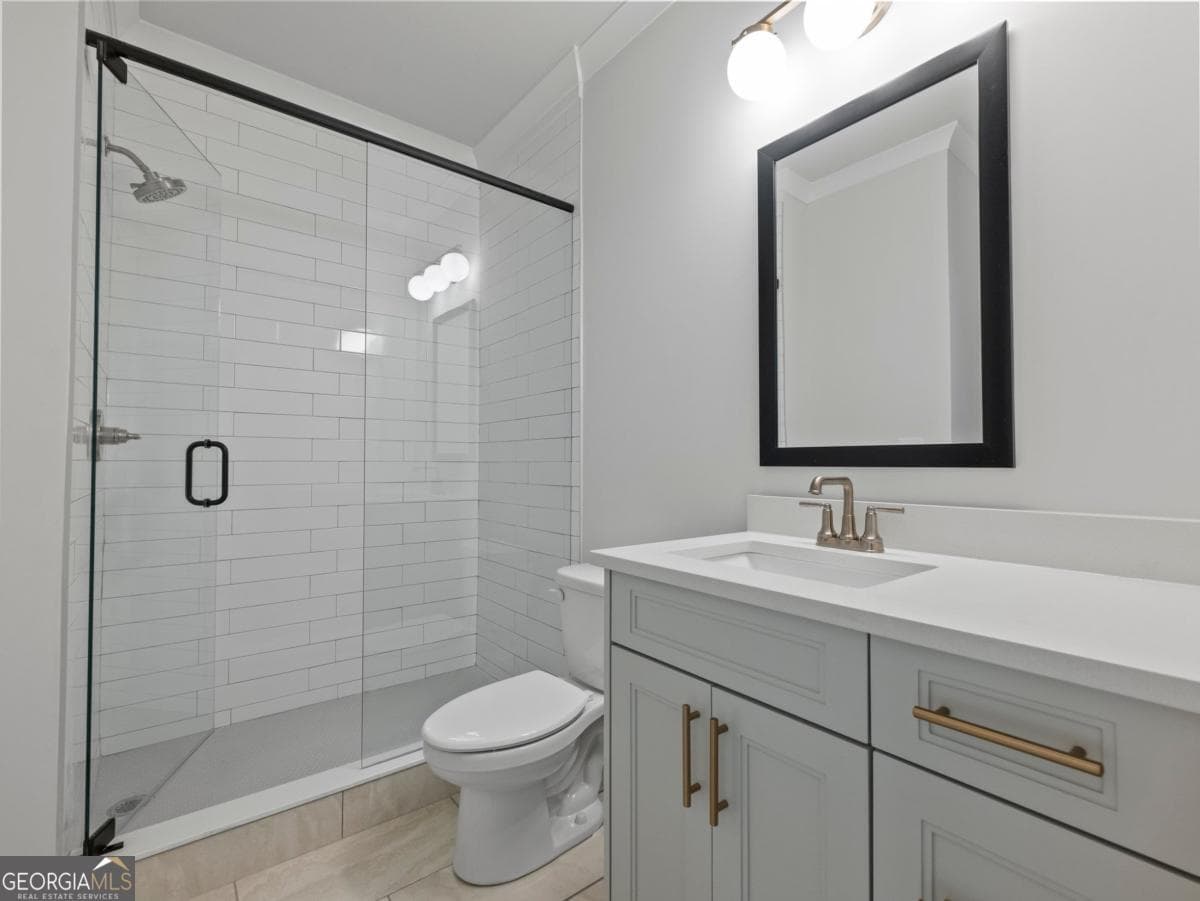 5 bedroom, 4 bathroom single family residence for sale at 2410 Reserve Manor Court, Lawrenceville, GA 30043 — photo 5