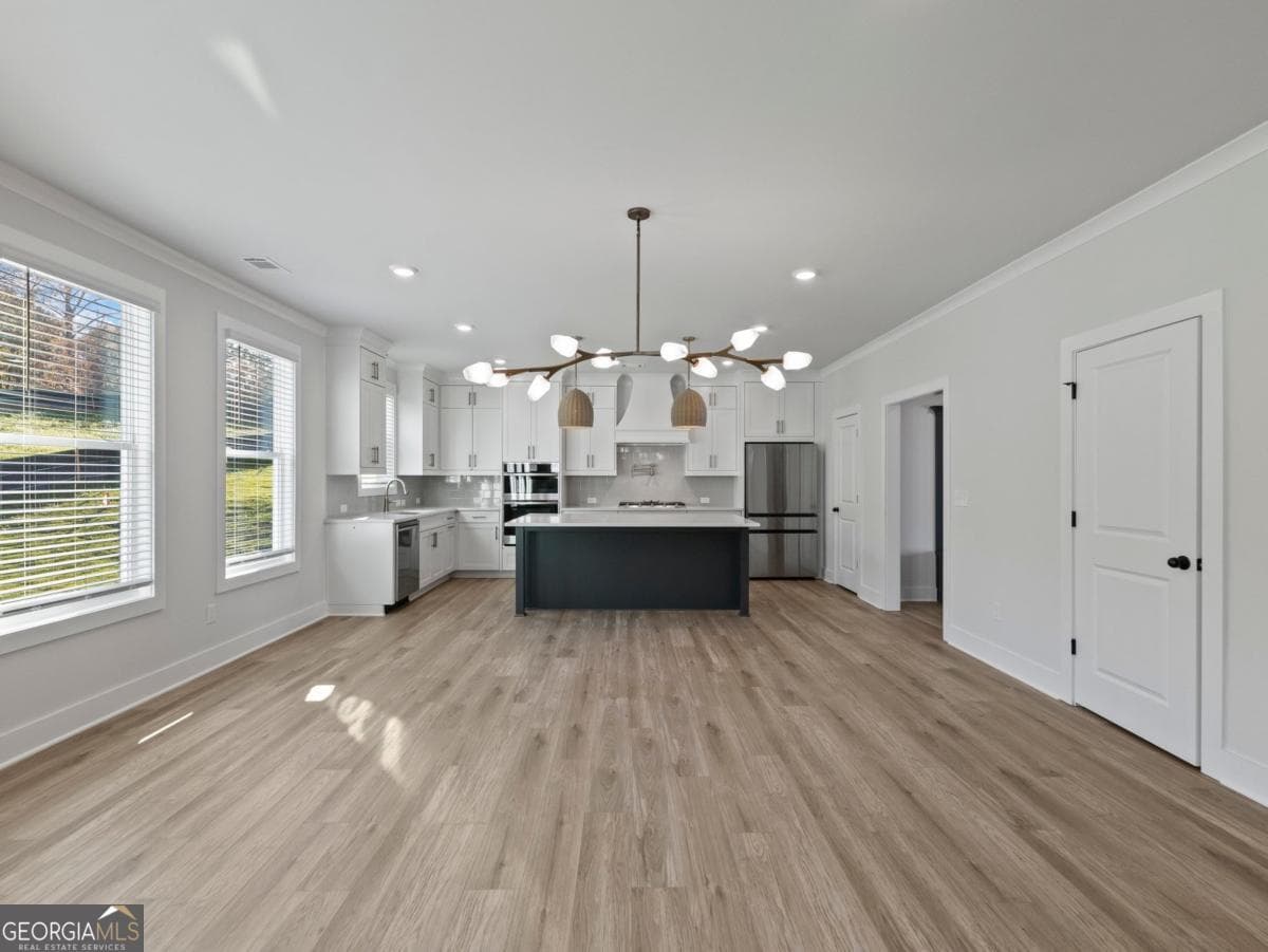 5 bedroom, 4 bathroom single family residence for sale at 2410 Reserve Manor Court, Lawrenceville, GA 30043 — photo 9