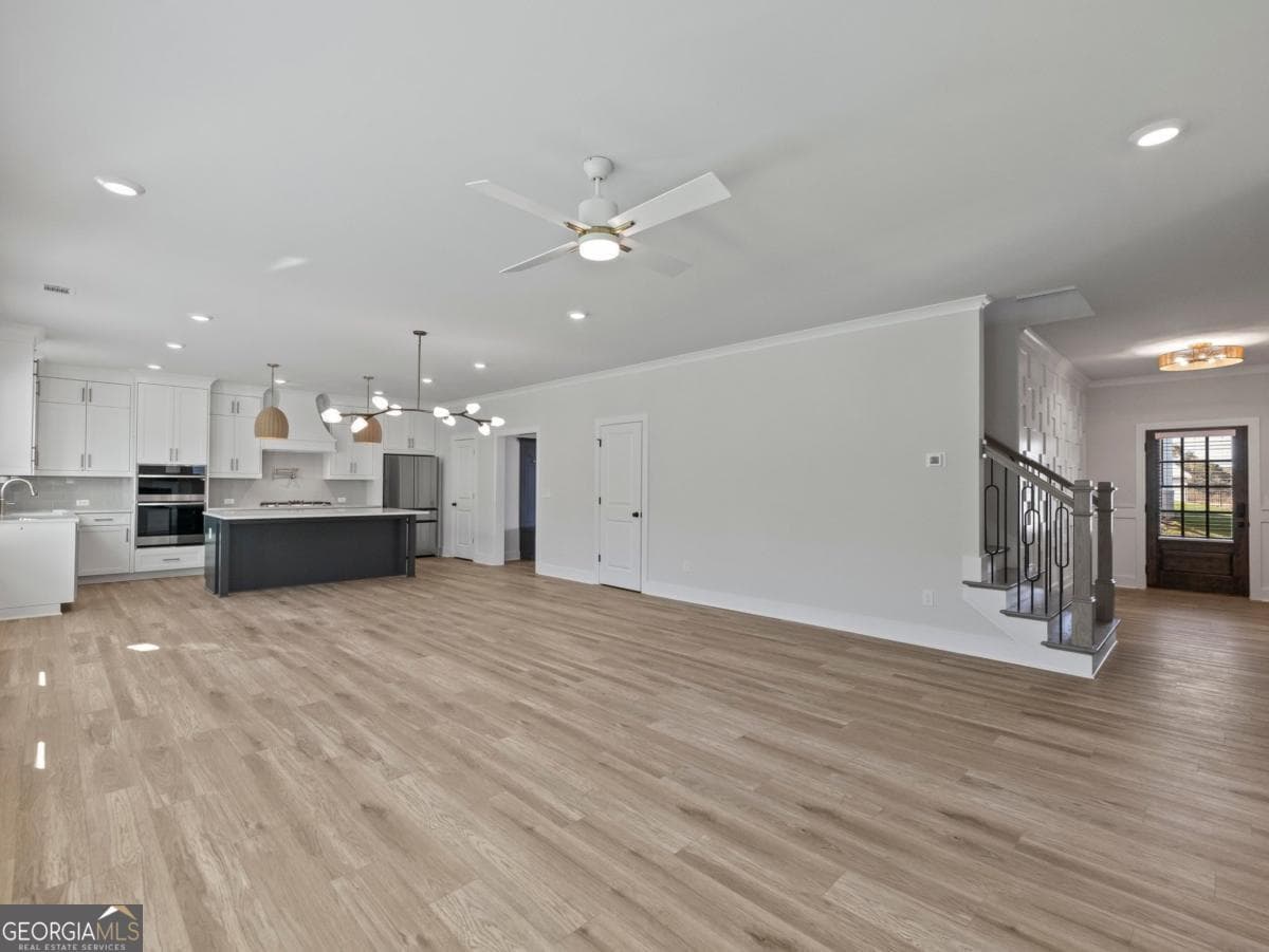 5 bedroom, 4 bathroom single family residence for sale at 2410 Reserve Manor Court, Lawrenceville, GA 30043 — photo 8