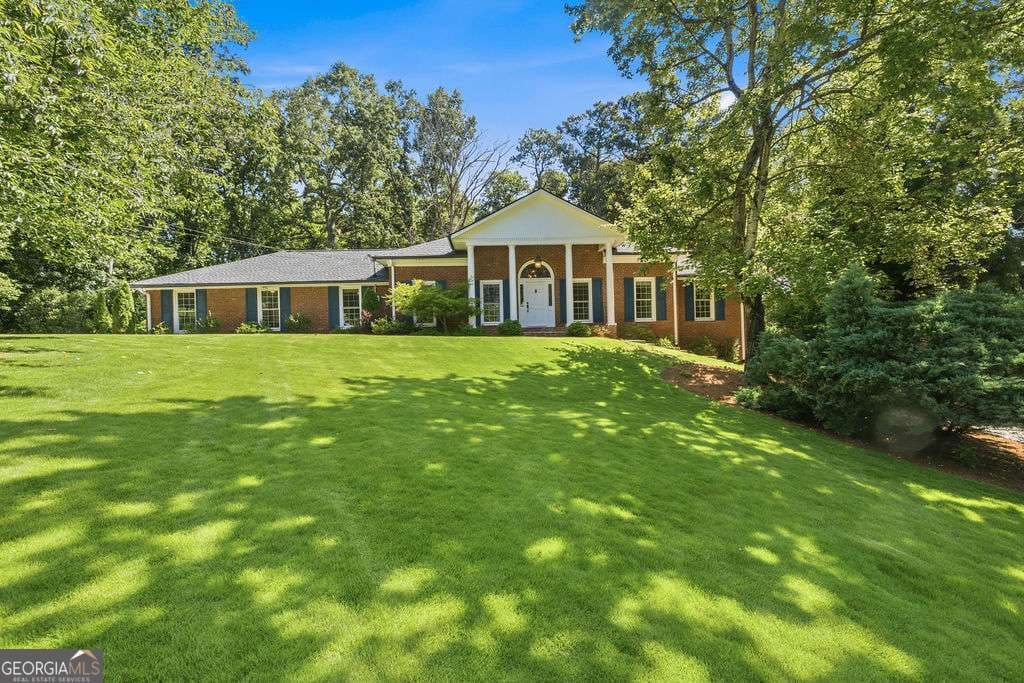 3 bedroom, 3 bathroom, 2,210 sq ft single family residence sold at 5607 Coronation Court, Dunwoody, GA 30338
