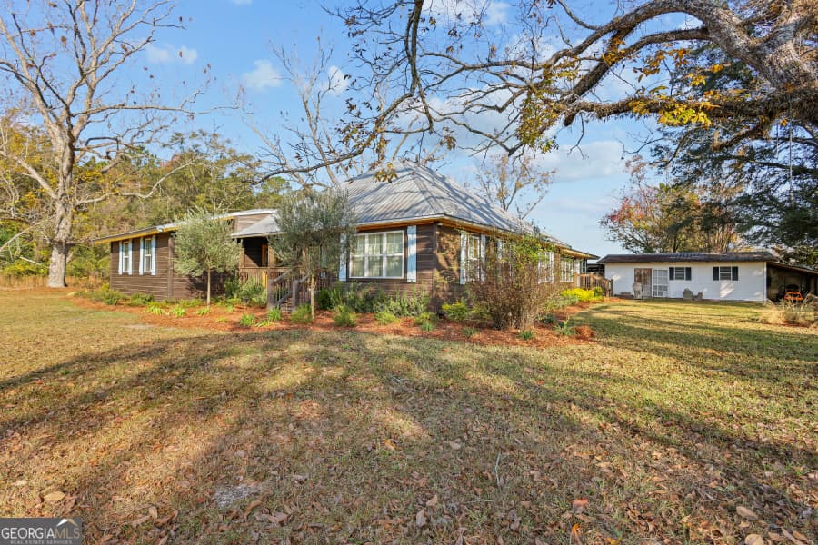 4 bedroom, 3 bathroom, 4,000 sq ft single family residence for sale at 5466 Robbin Road, Patterson, GA 31557 — photo 8