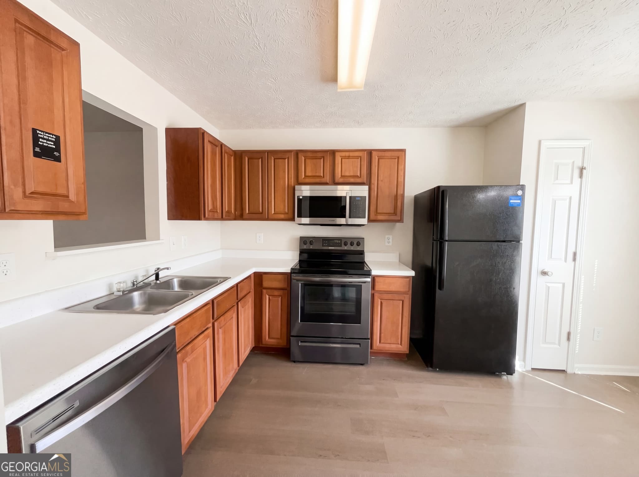 3 bedroom, 2.5 bathroom, 1,444 sq ft townhouse for sale at 4041 Browne Court, Conley, GA 30288 — photo 2