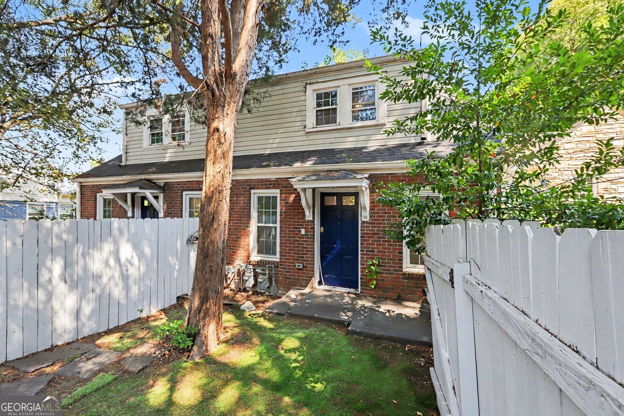 4 bedroom, 2 bathroom, 1,880 sq ft townhouse for sale at 1251 Monroe Drive, Atlanta, GA 30306 — photo 1 of 28