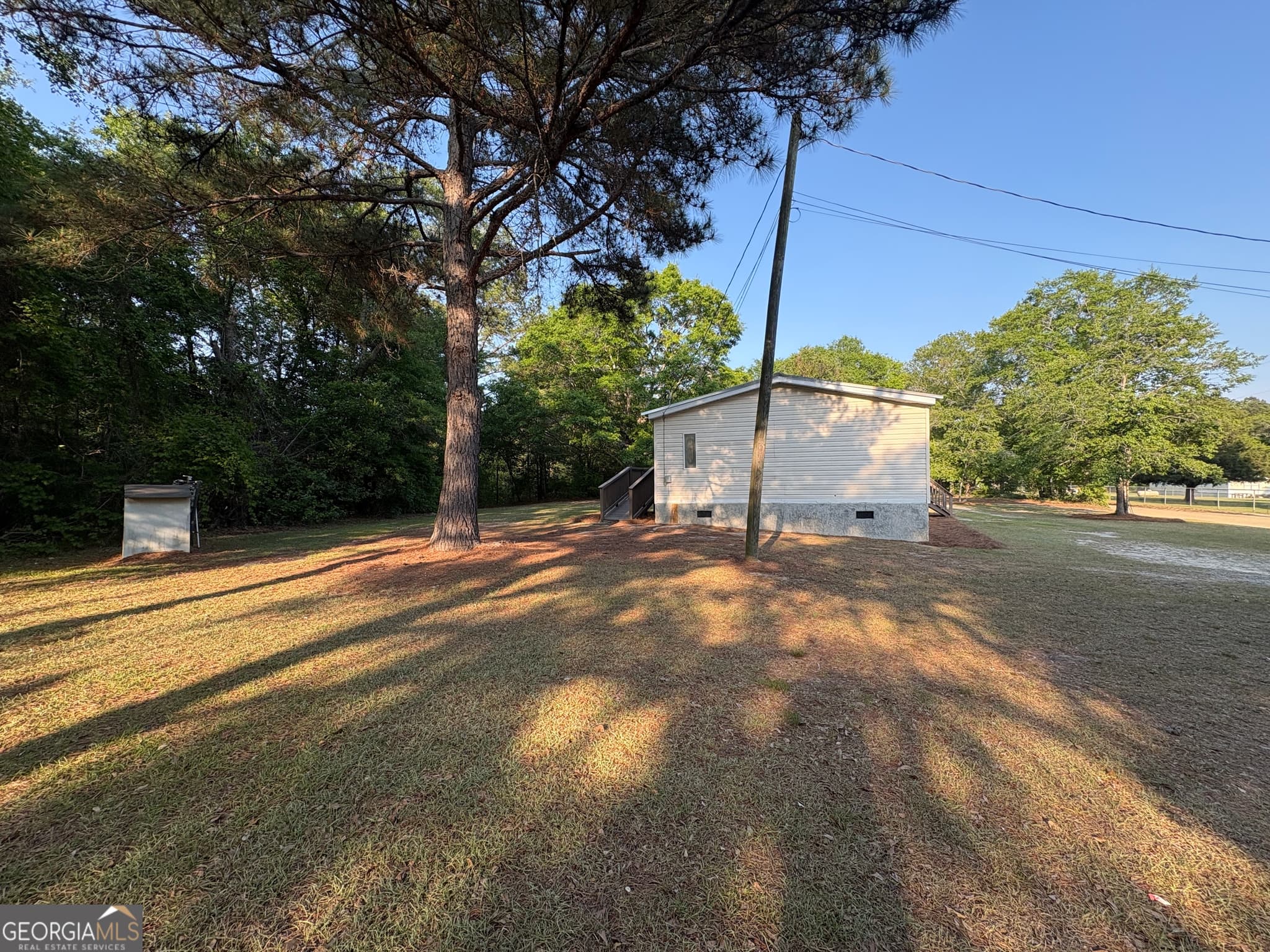 3 bedroom, 2 bathroom, 1,152 sq ft manufactured home,single family residence for sale at 46 Dove Lane, Eastman, GA 31023 — photo 5