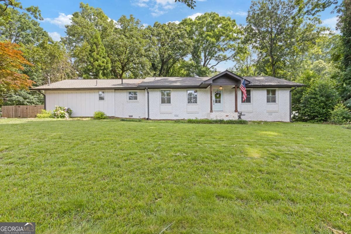 4 bedroom, 3 bathroom, 2,083 sq ft single family residence sold at 2165 Lower Roswell Road, Marietta, GA 30068
