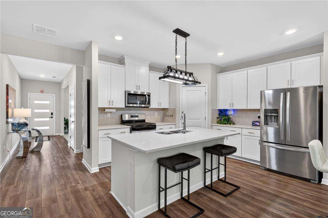 5 bedroom, 3 bathroom, 2,752 sq ft single family residence for sale at 4161 Dean Grove Wy Way, Loganville, GA 30052 — photo 3
