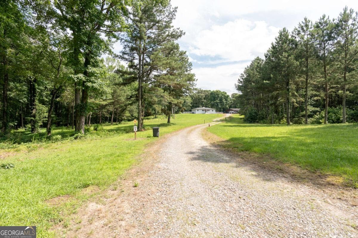 3 bedroom, 2 bathroom, 1,705 sq ft single family residence for sale at 1585 Jimmy Dodd Road, Buford, GA 30518 — photo 2