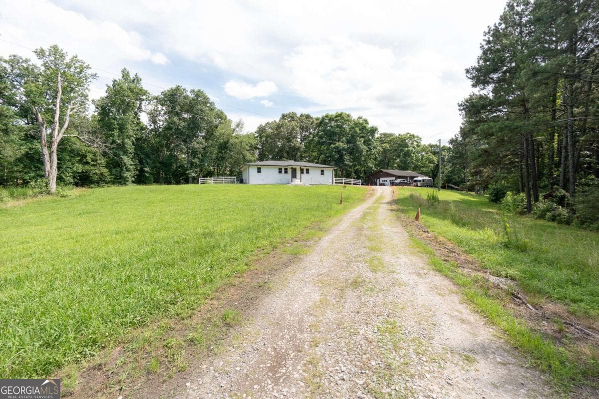 3 bedroom, 2 bathroom, 1,705 sq ft single family residence for sale at 1585 Jimmy Dodd Road, Buford, GA 30518 — photo 3