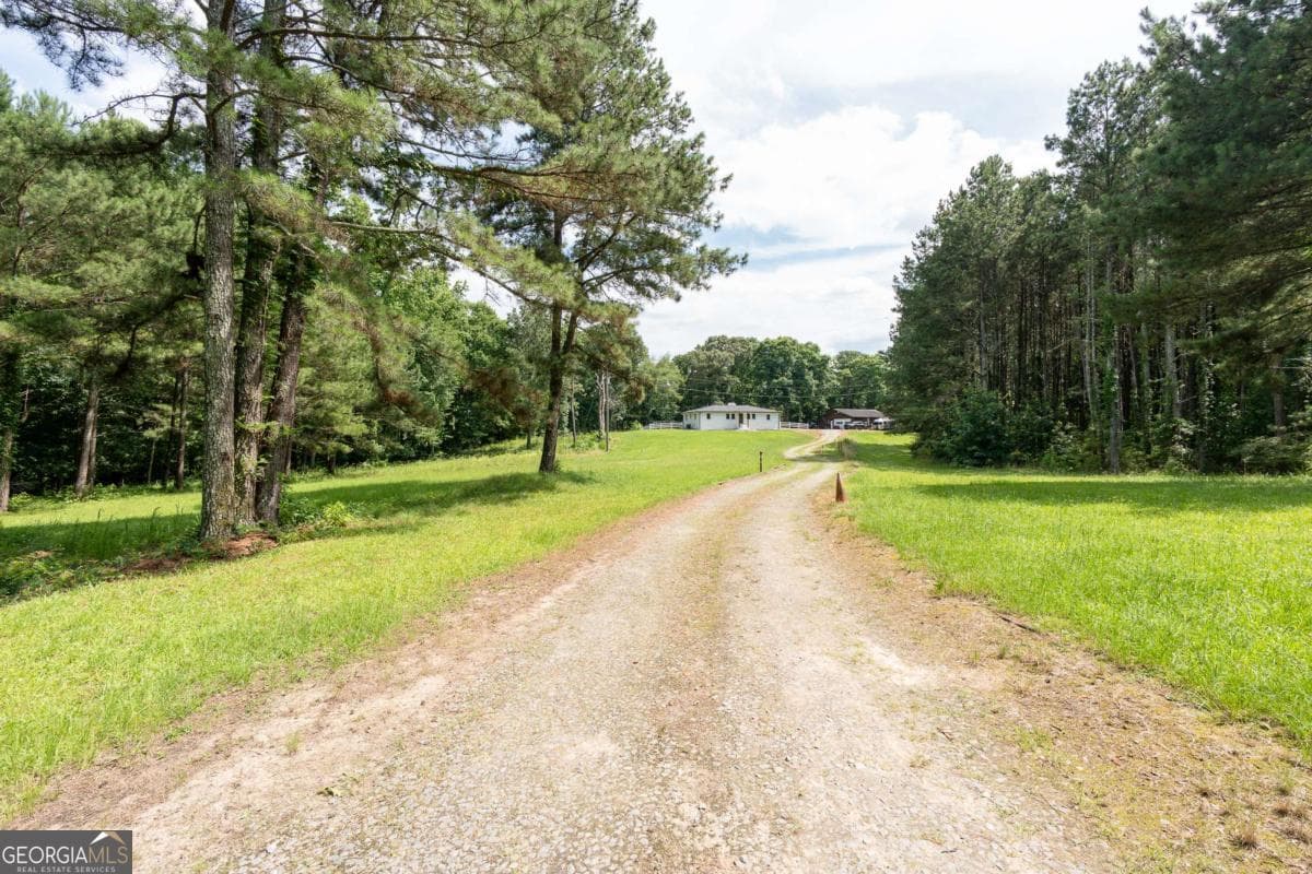 3 bedroom, 2 bathroom, 1,705 sq ft single family residence for sale at 1585 Jimmy Dodd Road, Buford, GA 30518