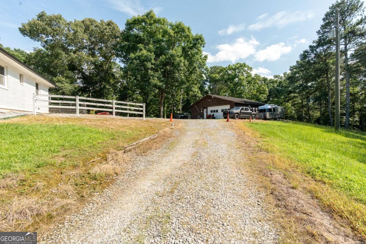 3 bedroom, 2 bathroom, 1,705 sq ft single family residence for sale at 1585 Jimmy Dodd Road, Buford, GA 30518 — photo 5