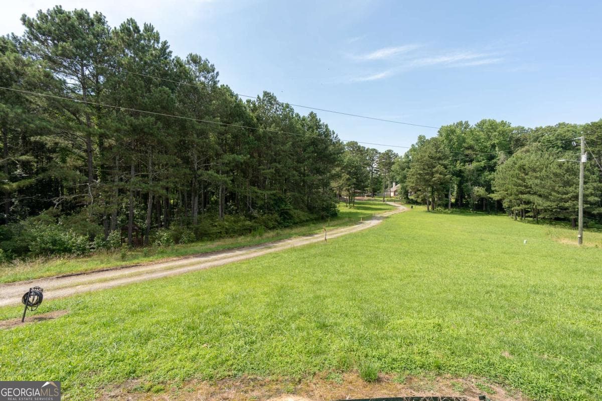 3 bedroom, 2 bathroom, 1,705 sq ft single family residence for sale at 1585 Jimmy Dodd Road, Buford, GA 30518 — photo 10