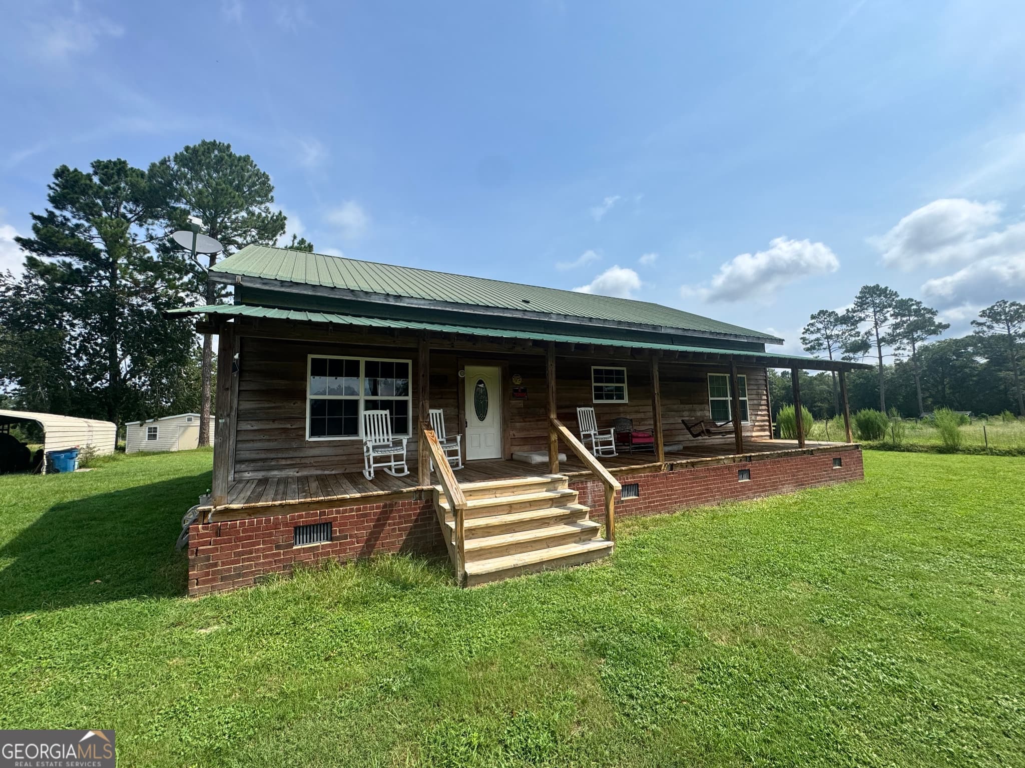 2 bedroom, 2 bathroom, 1,536 sq ft cabin,single family residence for sale at 470 Ed Harrell Road, Hortense, GA 31543 — photo 2