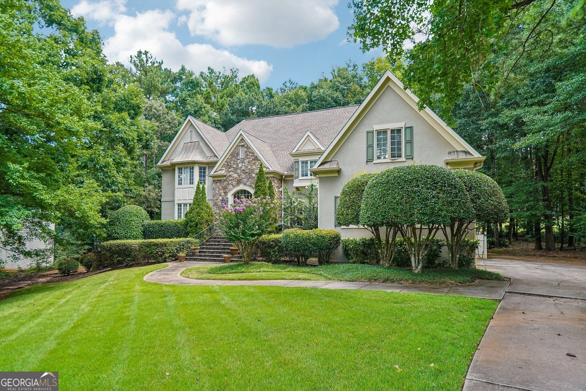 7 bedroom, 6.5 bathroom, 7,840 sq ft single family residence for sale at 219 Saint Andrews Court, Mcdonough, GA 30253 — photo 2