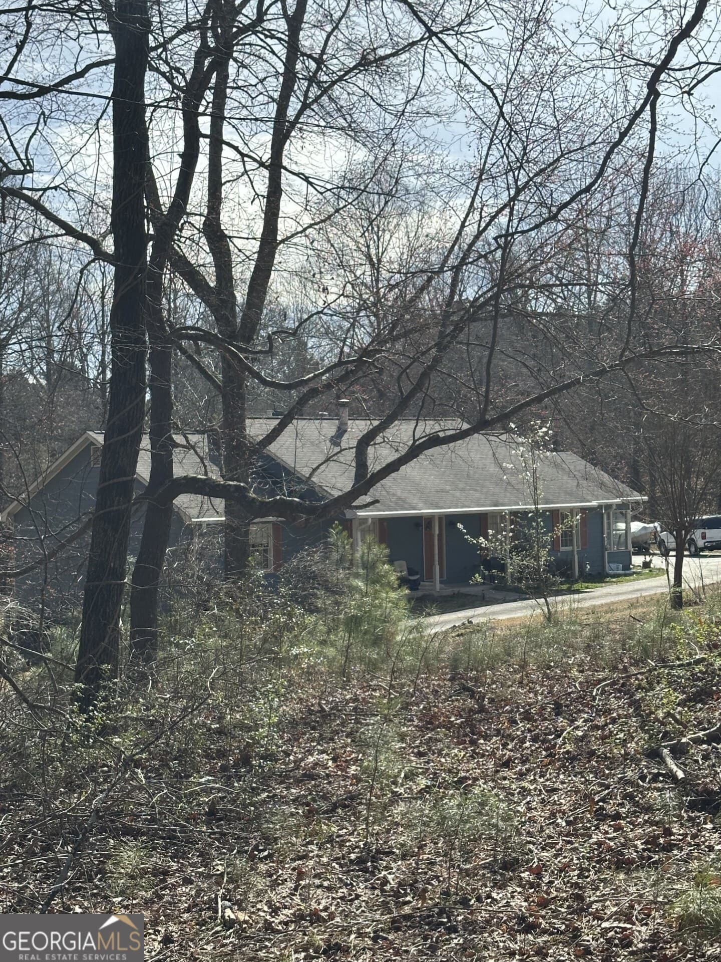 4 bedroom, 3 bathroom, 4,188 sq ft single family residence for sale at 5565 Hog Mountain Road, Flowery Branch, GA 30542