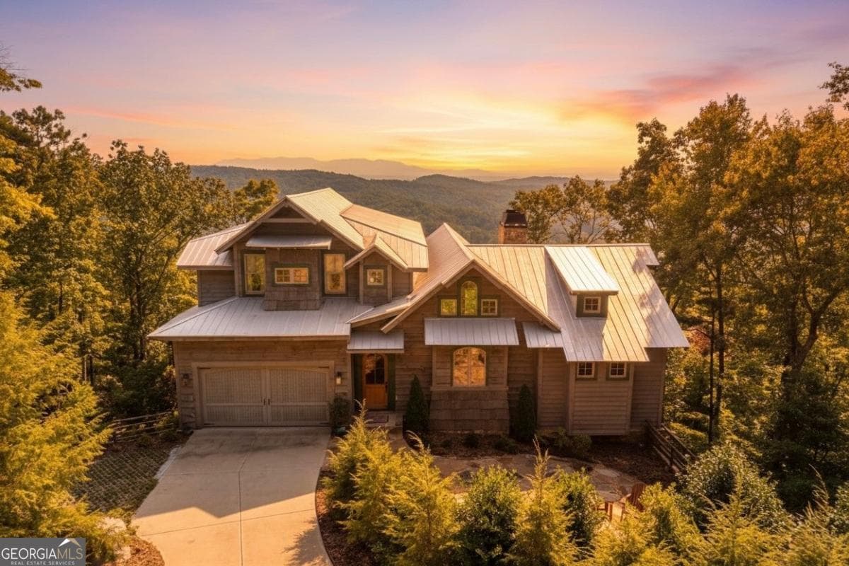 5 bedroom, 6 bathroom, 4,702 sq ft single family residence for sale at 207 Utana Bluffs Trail, Ellijay, GA 30540 — photo 1 of 65